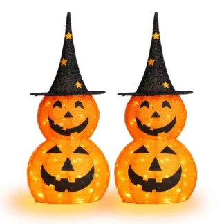 Set of three collapsible orange pumpkin Halloween decorations on a porch